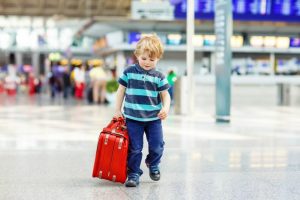 Little boy with suitcase