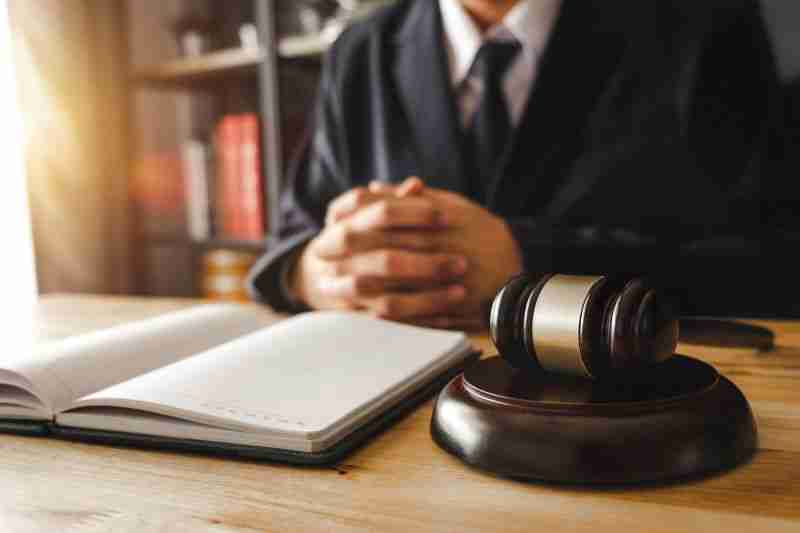 Judge with law book