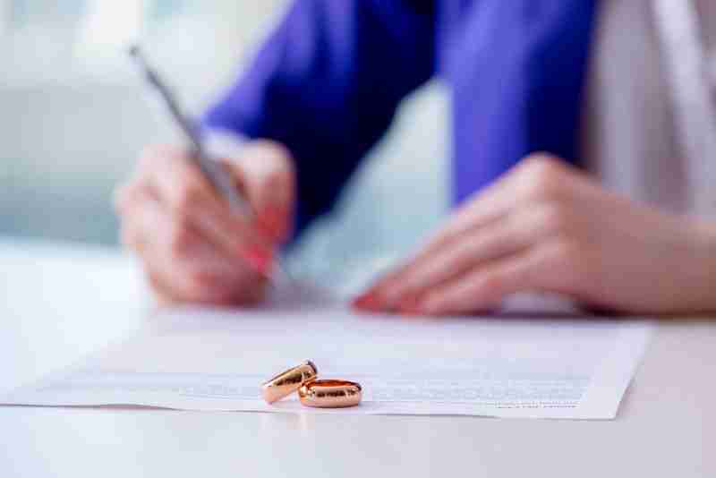 married woman signing documents