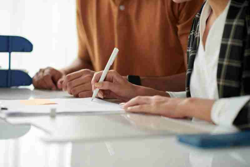 spouses signing documents