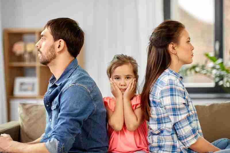estranged couple with little girl