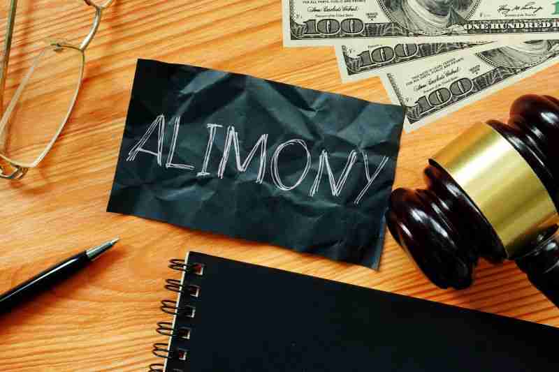 alimony written on card