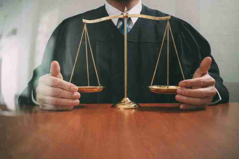 Judge with justice scales