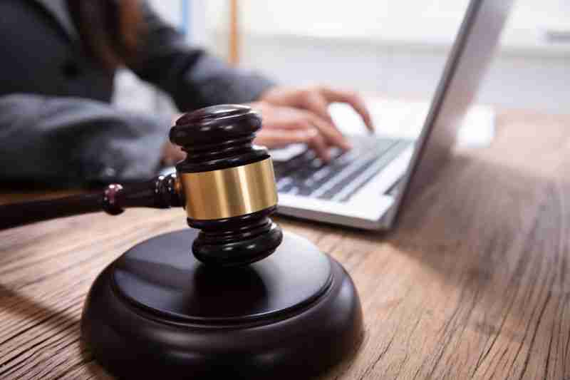 Judicial gavel with laptop