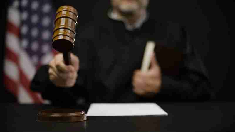 judge with gavel and paper