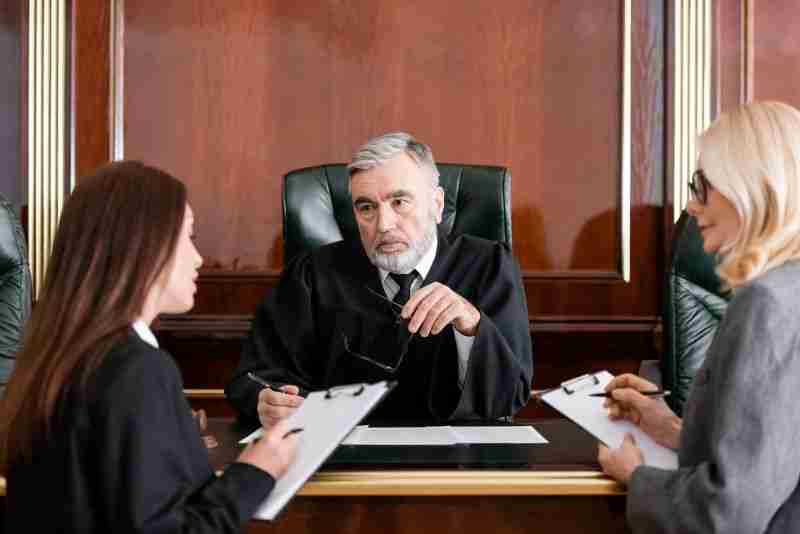 judge looking at attorneys