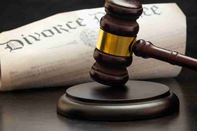 folded decree with gavel
