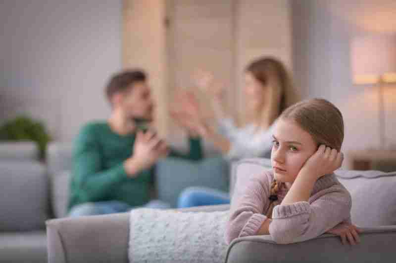 parents arguing around child