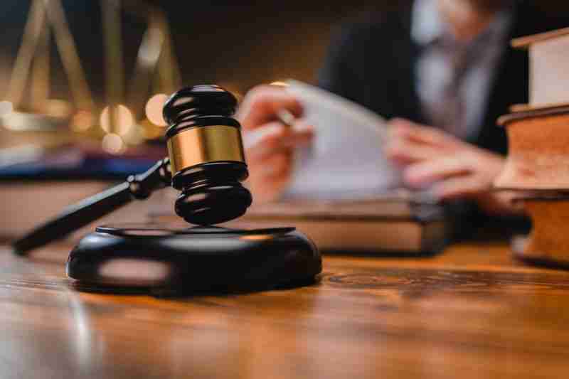 Judge reading behind gavel